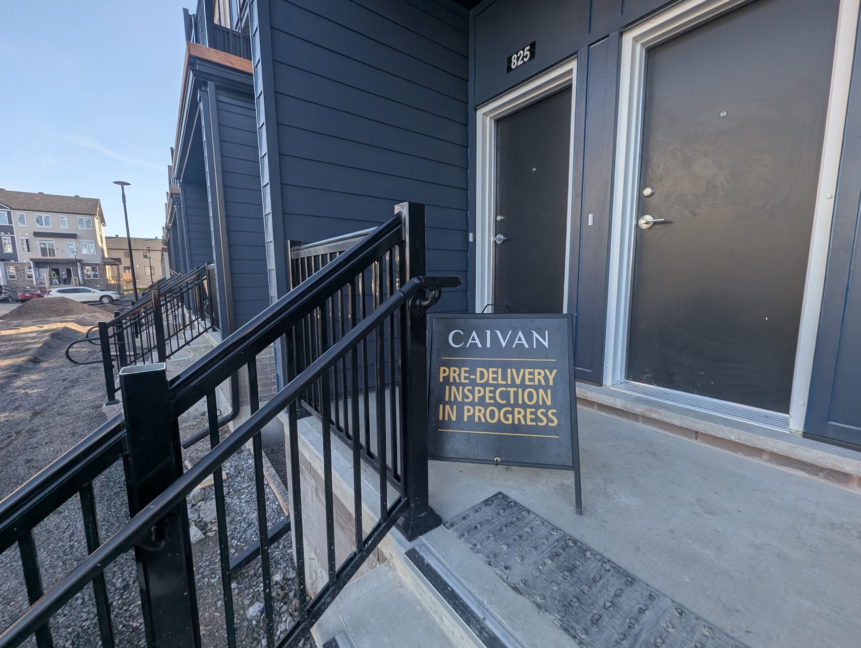 Exterior of a new stacked townhome in Orléans Village, Ottawa, before the pre-delivery inspection